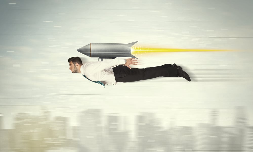 Superhero business man flying with jet pack rocket above the city concept